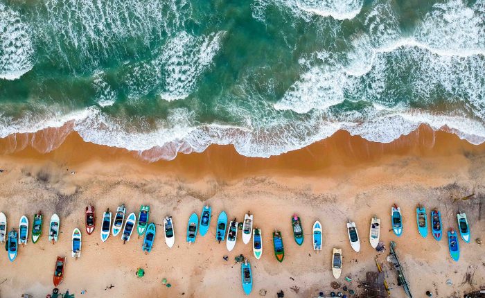 Arugam-bay-beach-with-boats-Sri-Lanka Sri Lanka Voyages